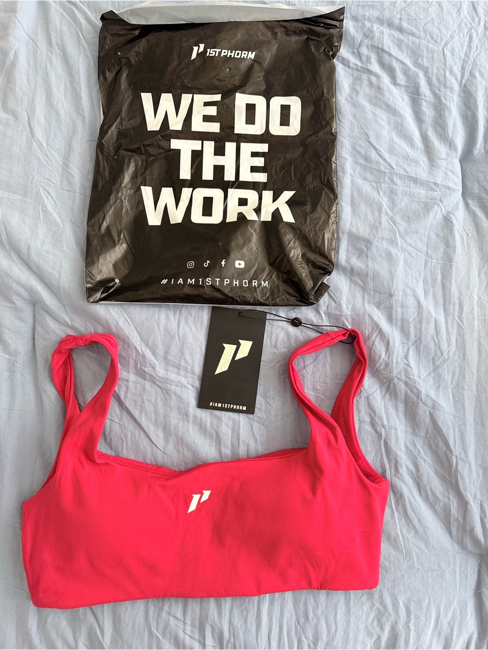Women’s 1st Phorm watermelon red square neck sports bra size medium new in bag.